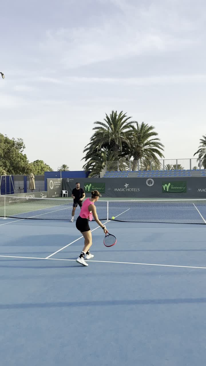 Competitive tennis action on court